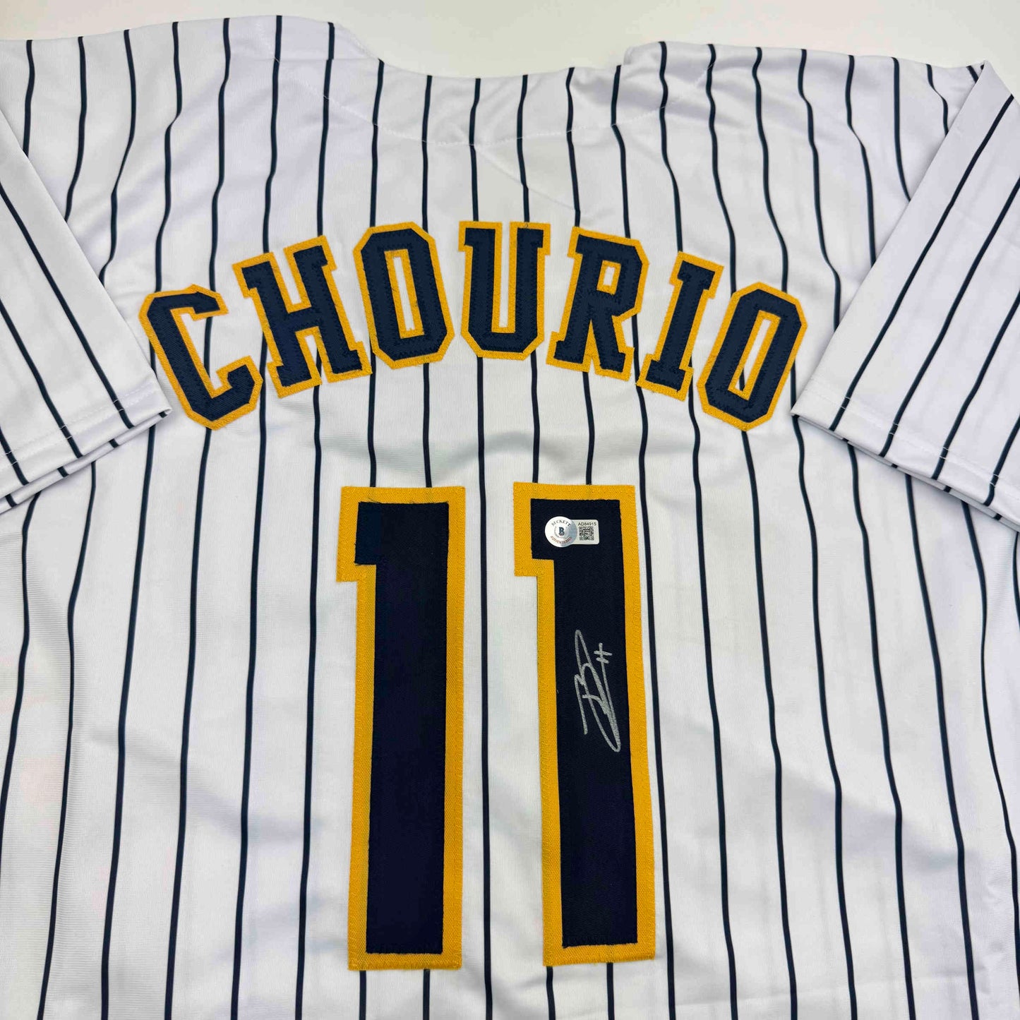 Autographed/Signed Jackson Chourio Milwaukee Pinstripe Baseball Jersey Beckett BAS COA